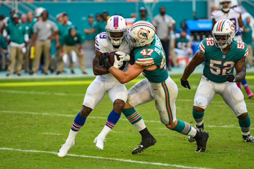 Miami Dolphins outside linebacker Kiko Alonso (47) with the hit on Buffalo Bills wide receiver Isaiah McKenzie (19)