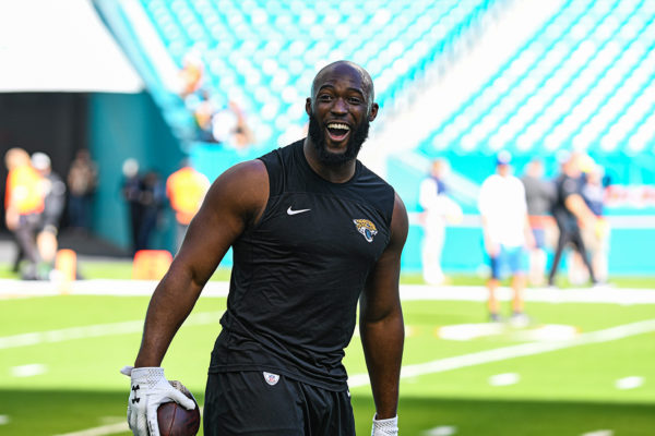 Jacksonville Jaguars running back Leonard Fournette (27) shares a laugh during warmups