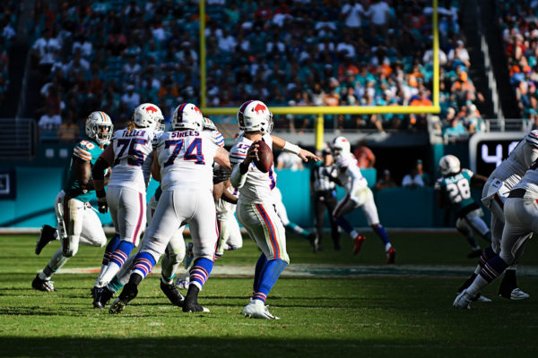 Buffalo Bills quarterback Josh Allen (17) rears back to throw deep