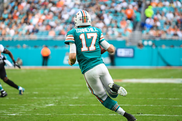 Miami Dolphins quarterback Ryan Tannehill (17) scrambles