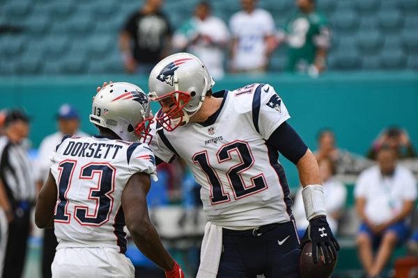 New England Patriots quarterback Tom Brady (12) and New England Patriots wide receiver Phillip Dorsett (13)