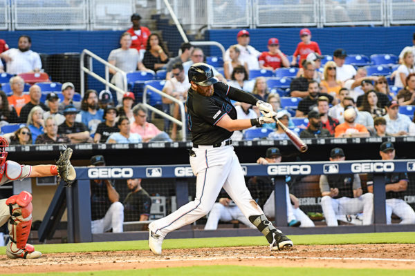 Miami Marlins left fielder Austin Dean (44) hits a homerun