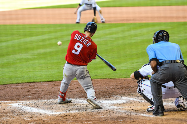 Washington Nationals second baseman Brian Dozier #9 hits a homerun