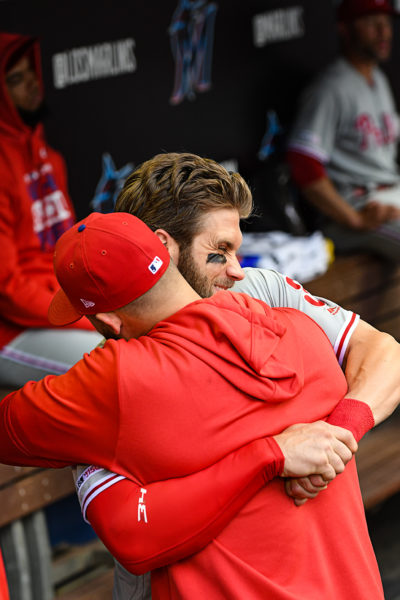 Philadelphia Phillies right fielder Bryce Harper (3) hugs it out in a pregame ritual