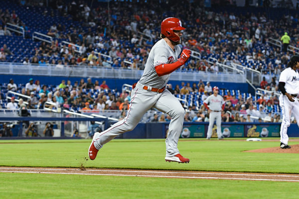 Philadelphia Phillies right fielder Bryce Harper (3) tries to beat the throw to first