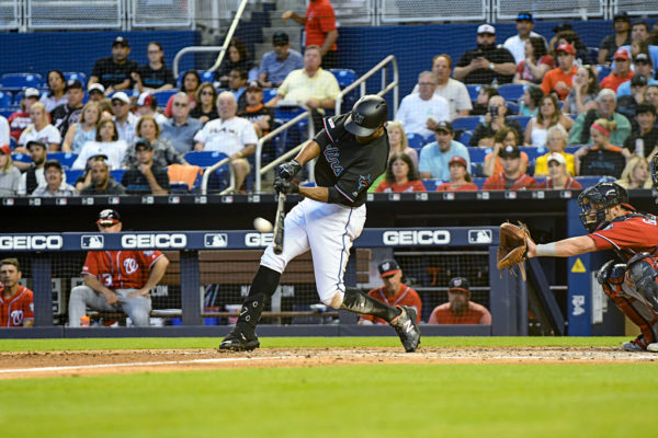 Miami Marlins left fielder Curtis Granderson #21 hits a home run