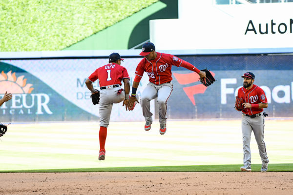 Washington Nationals left fielder Juan Soto #22 and Washington Nationals shortstop Wilmer Difo #1