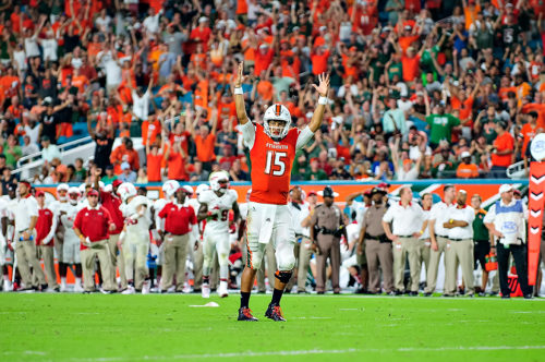 Hurricanes QB, Brad Kaaya, celebrates a Mark Walton rushing touchdown