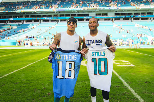 Kenny Stills and Rishard Matthews exchange jerseys after the game