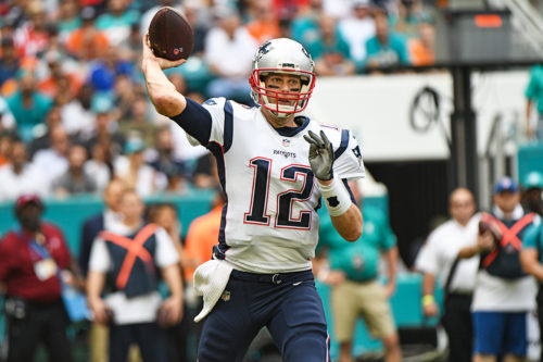 New England Patriots quarterback Tom Brady (12) throws a pass