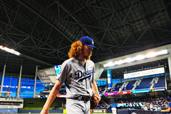 LA Dodgers starting pitcher Dustin May (85) walks back to the dugout