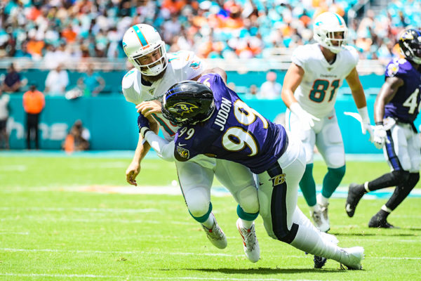 Baltimore Ravens outside linebacker Matt Judon (99) hits Miami Dolphins quarterback Ryan Fitzpatrick (14) | Baltimore Ravens vs. Miami Dolphins | September 8, 2019 | Hard Rock Stadium